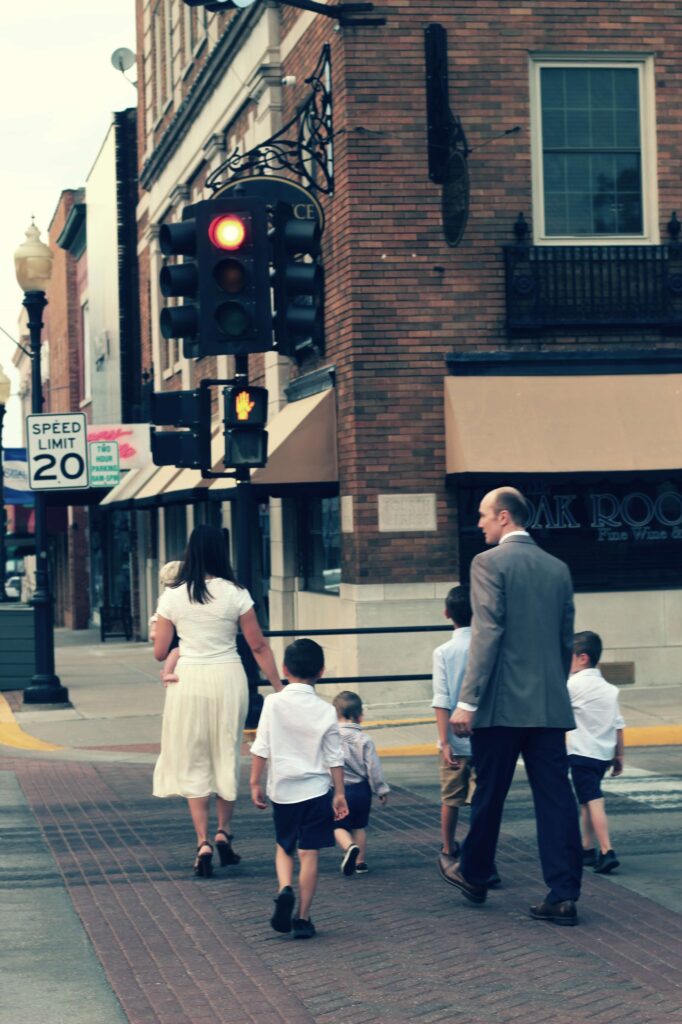 picture of family crossing the street