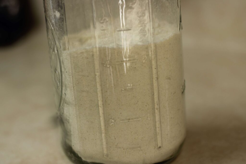 dried masa harina in glass jar