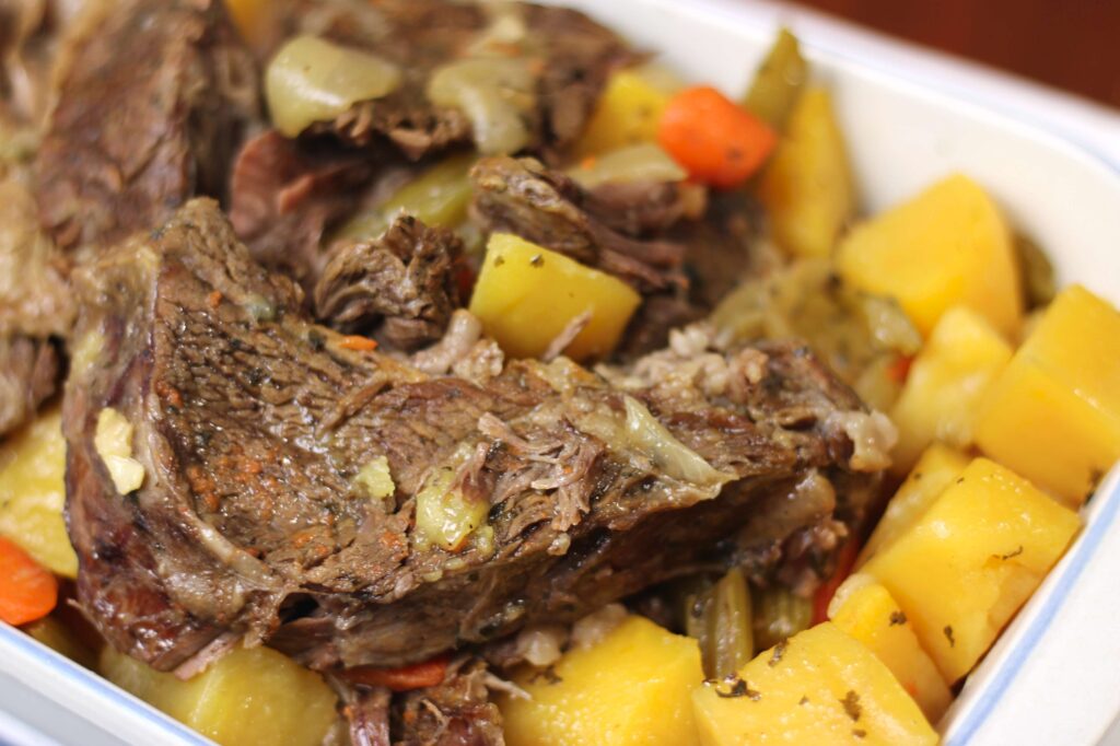 close up of pot roast and potatoes and carrots