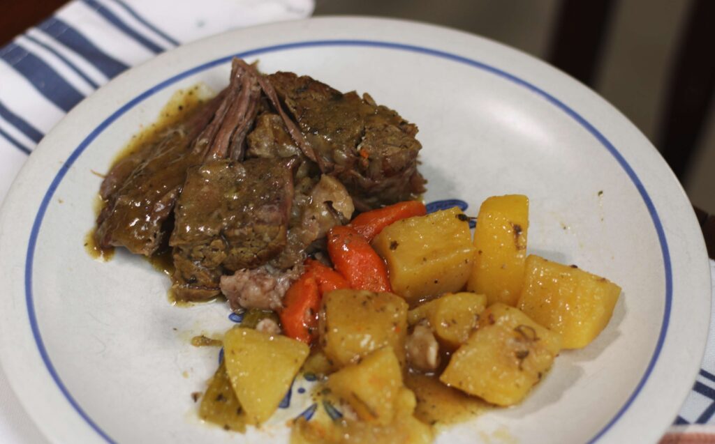 plate of dutch oven cooked pot roast and vegetables