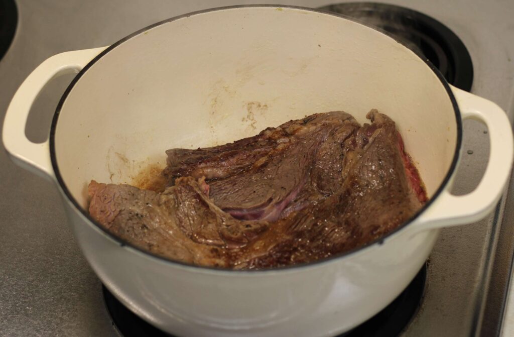 chuck roast browning in dutch oven 