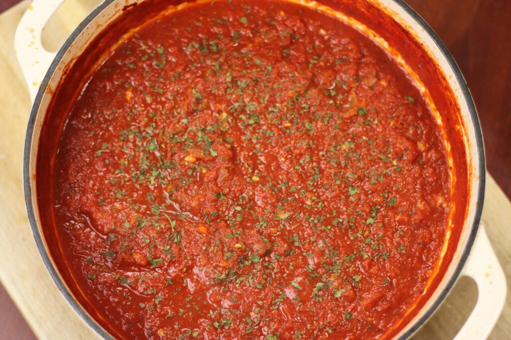 homemade marinara sauce in dutch oven