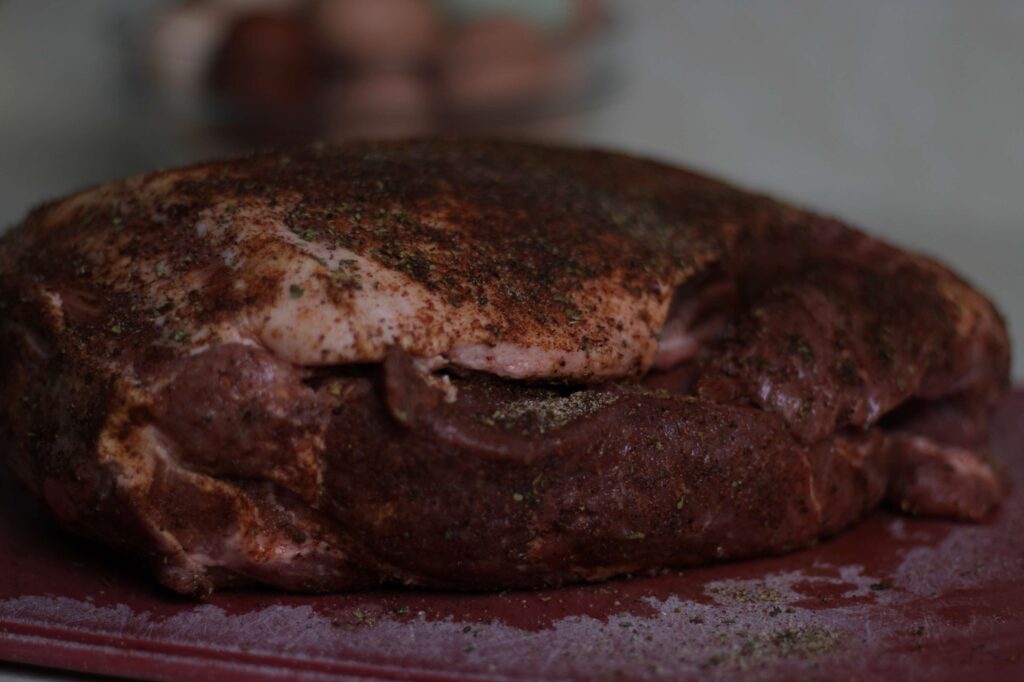 uncooked pork carnitas roast