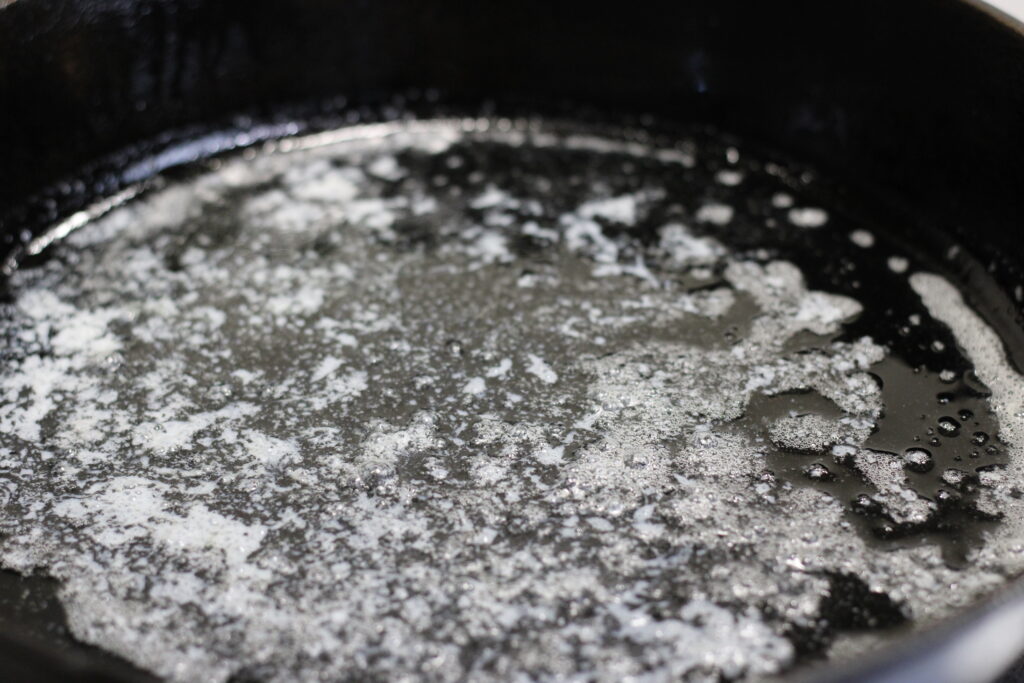 melted butter in cast iron skillet