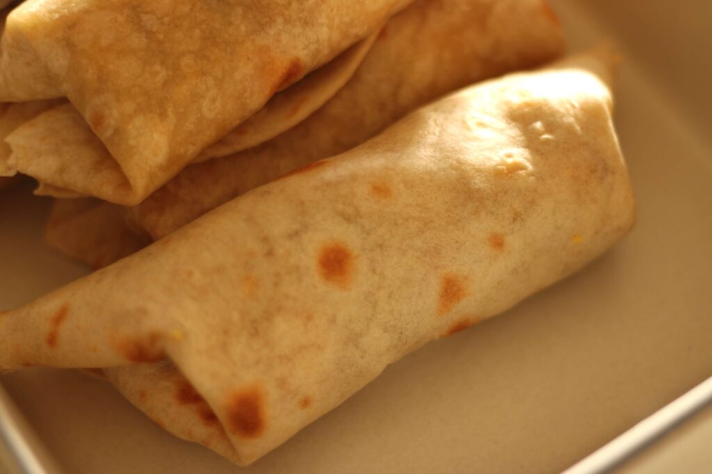 close up of breakfast burrito