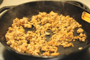 ground turkey fried in cast iron skillet