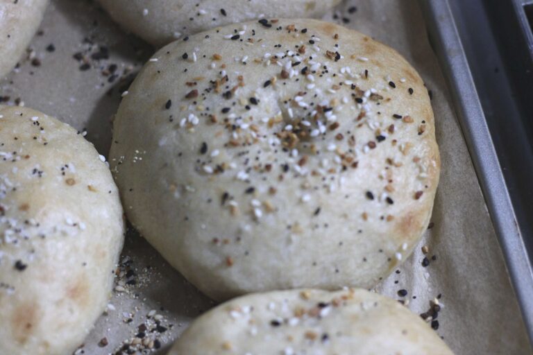 easy sourdough bagel on baking sheet