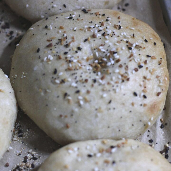 easy sourdough bagel on baking sheet