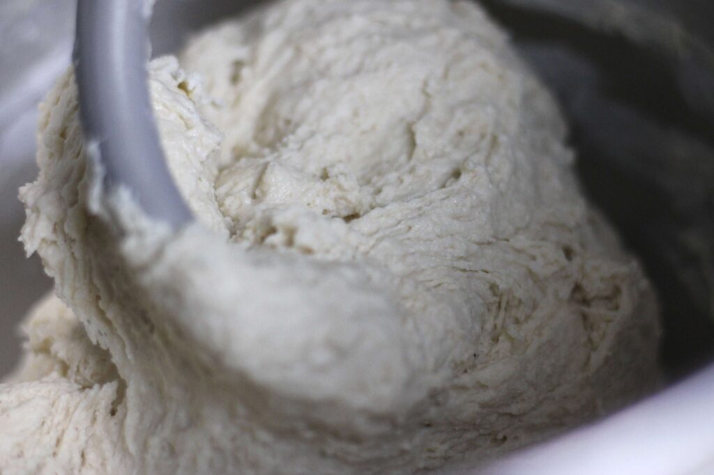 dough in mixer bowl with hook attachment 