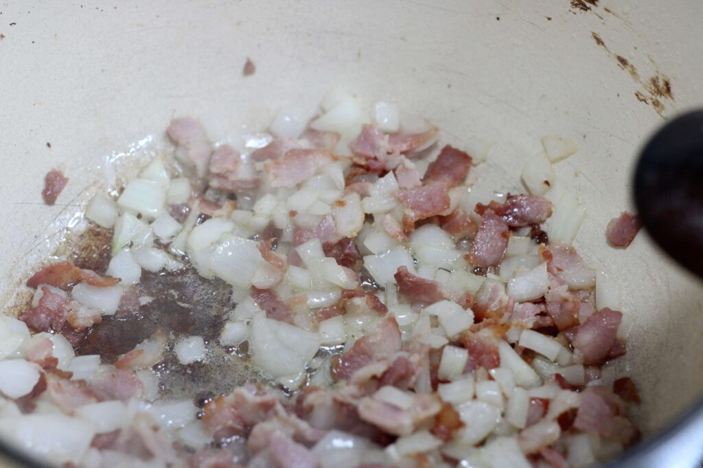 sautéed onions and garlic with fried bacon n