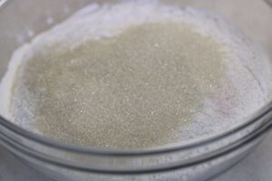 unrefined cane sugar and flour in a glass bowl