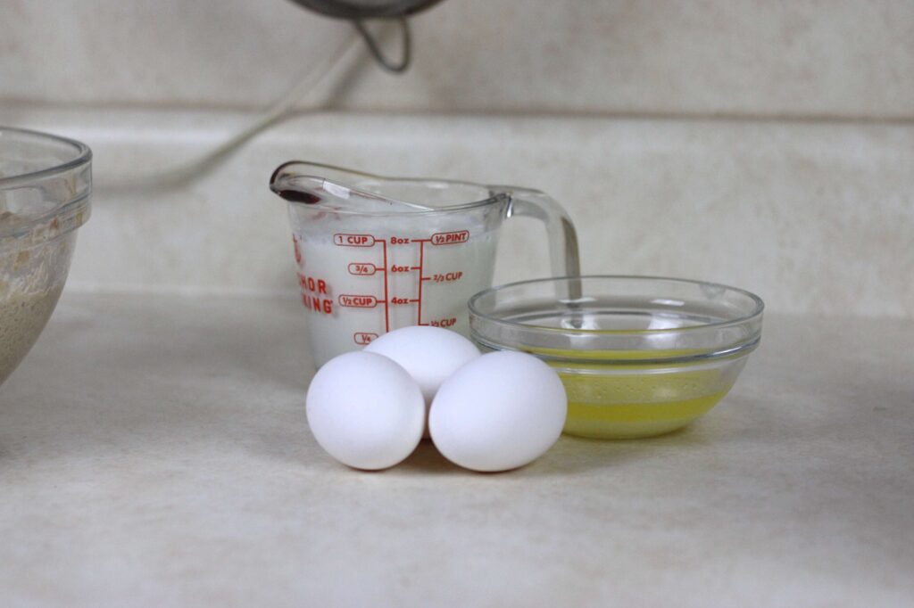 1 cup of milk, 3 eggs, melted butter to make classic sourdough pancakes 