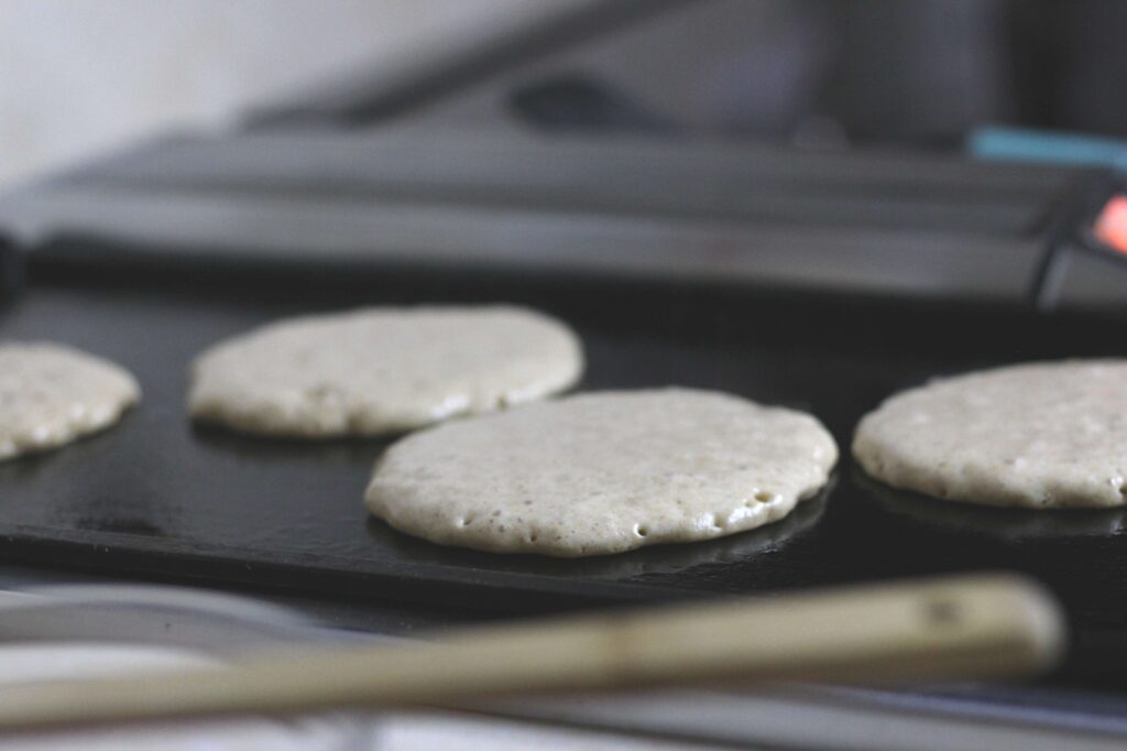 sourdough pancakes being cooked 