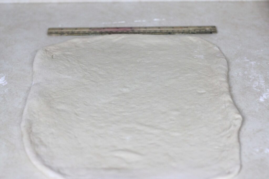 sourdough pastry dough rolled out to a 12" by 16" rectangle 