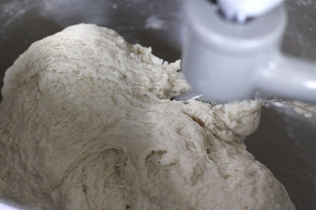 process shot of sourdough pastry dough in mixer bowl