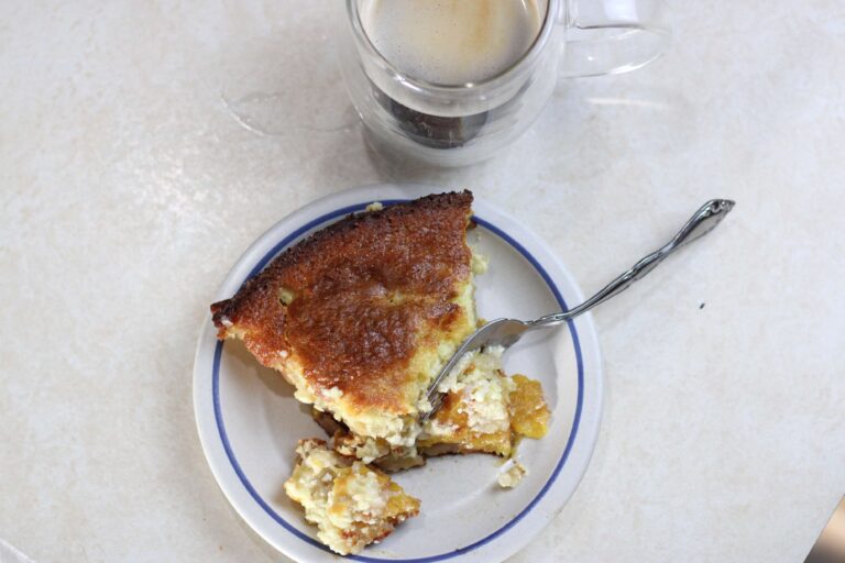 half eaten slice of sourdough peaches and cream dump cake