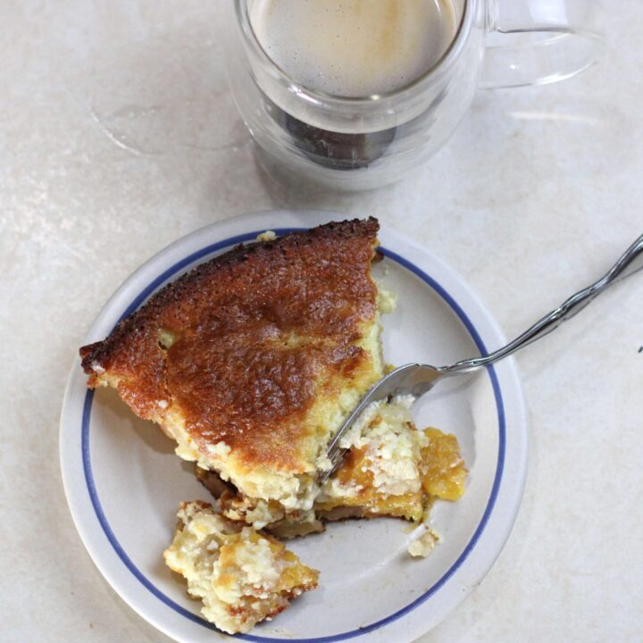 half eaten slice of sourdough peaches and cream dump cake