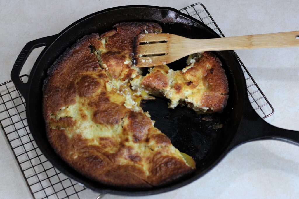 sourdough peaches and cream dump cake skillet