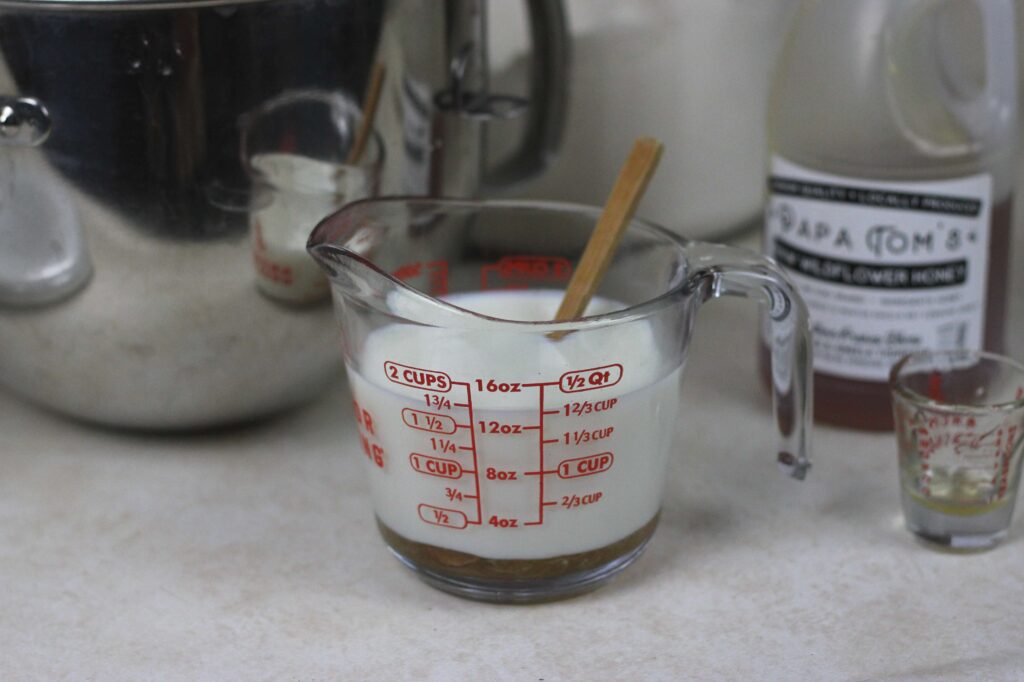 picture of milk in glass measuring cup