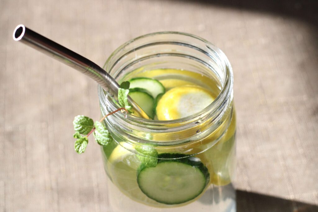 water with lemon,cucumber and mint in a mason jar