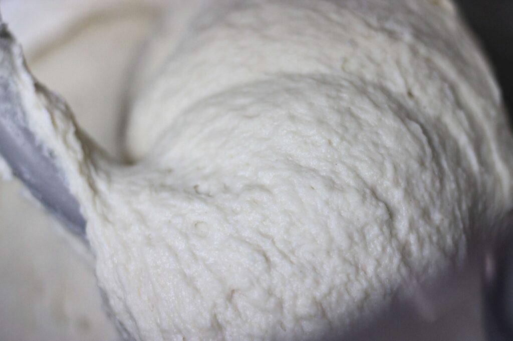 sourdough pizza dough in mixer 