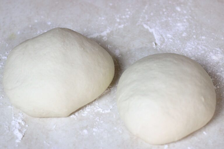 sourdough pizza dough balls on counter