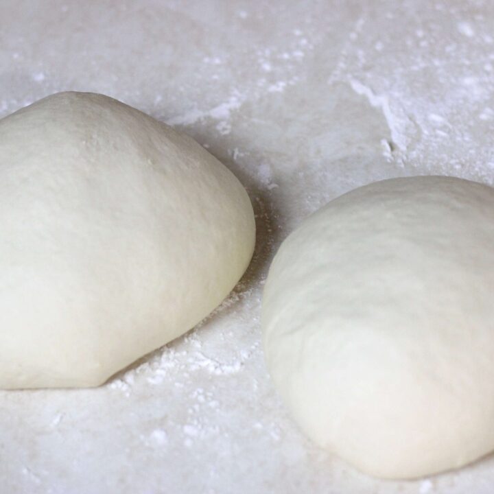 sourdough pizza dough balls on counter