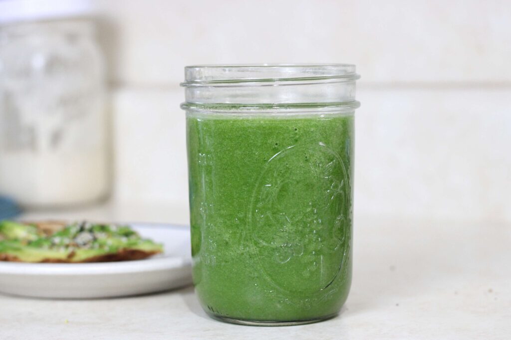 green smoothie in pint mason jar