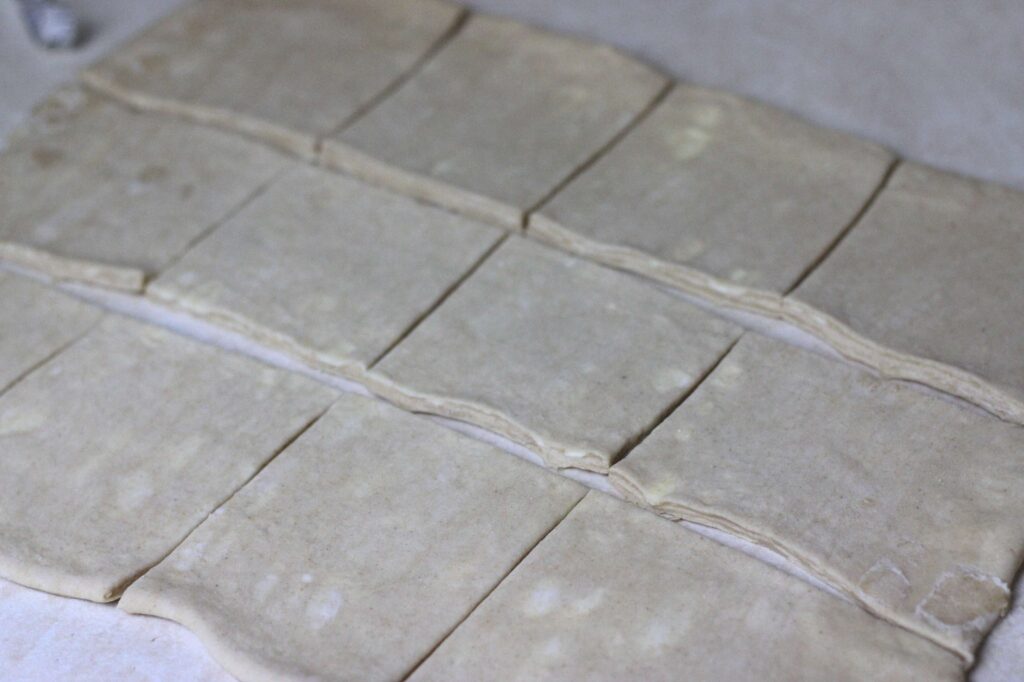 sourdough puff pastry cut into 4 by 4 inch squares to make spiced apple sourdough danish