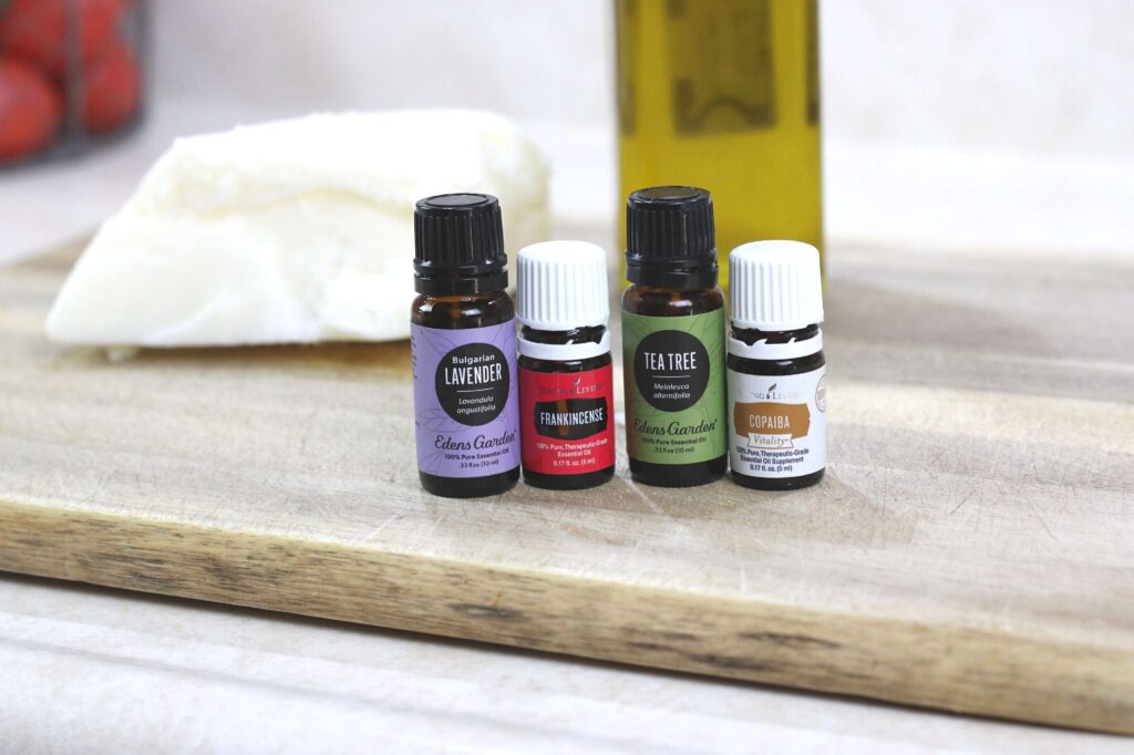 lavender, frakincense, tea tree, and copiba essential oils for homemade tallow balm 