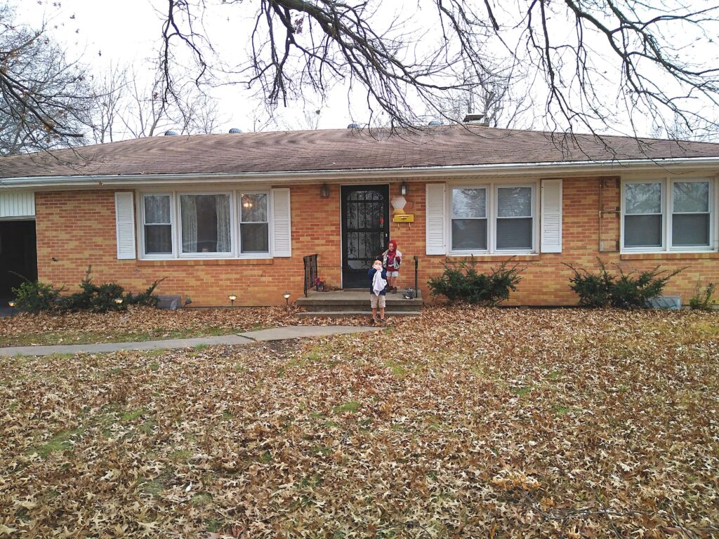 basic ranch style home with brick faced 