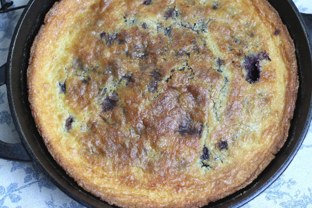 sourdough discard cherry cobbler in cast iron skillet 