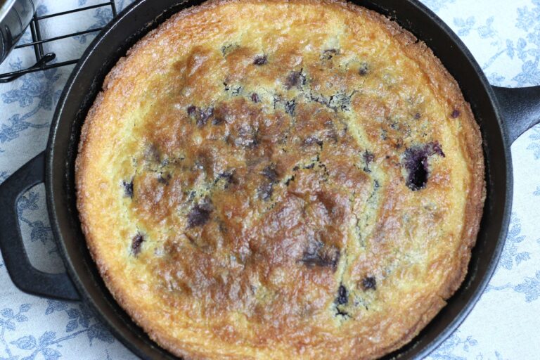 sourdough discard cherry cobbler cooked in a cast iron skillet