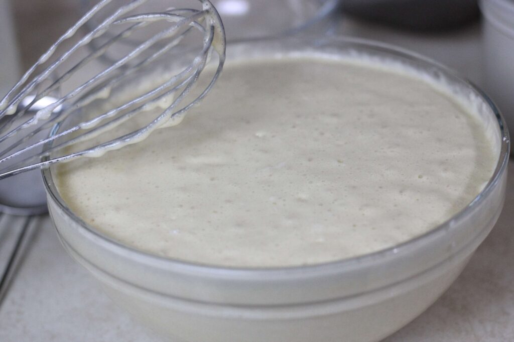 sourdough discard cobble batter in large glass bowl whisk to the side 