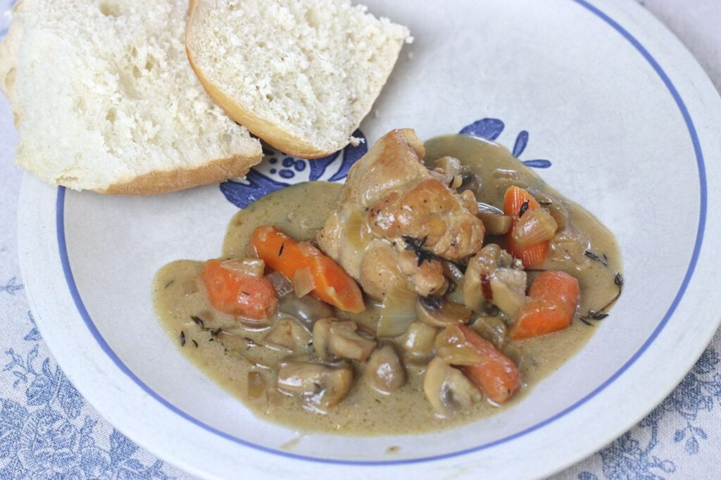 Chicken Fricassee served with a side of bread