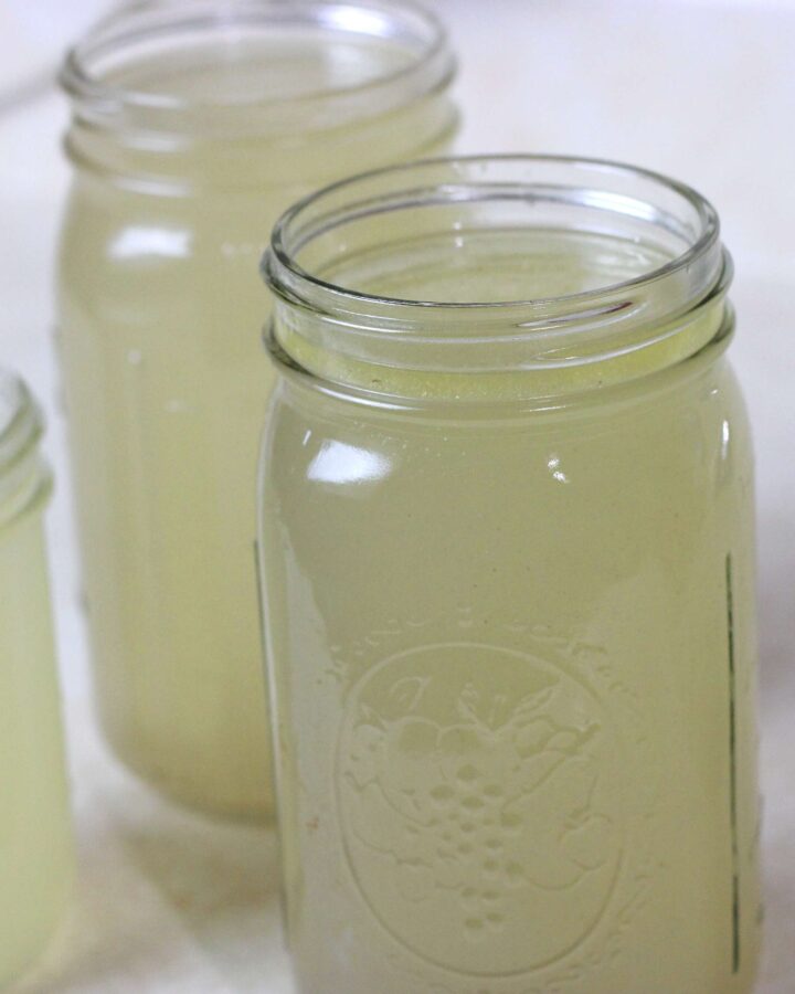 Homemade chicken broth in jars