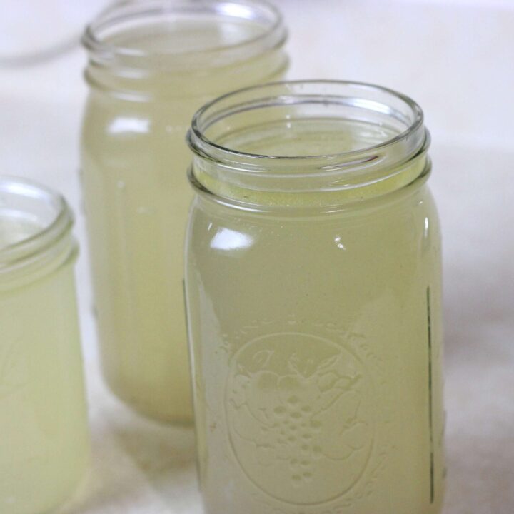 Homemade chicken broth in jars