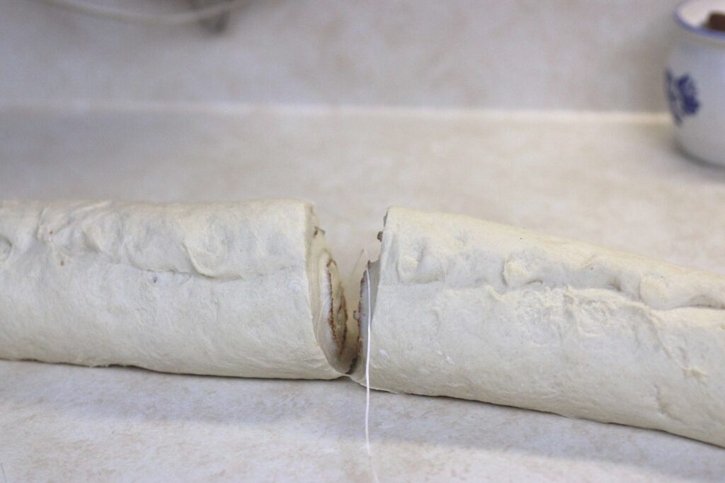  uncooked cinnamon roll cut in half 