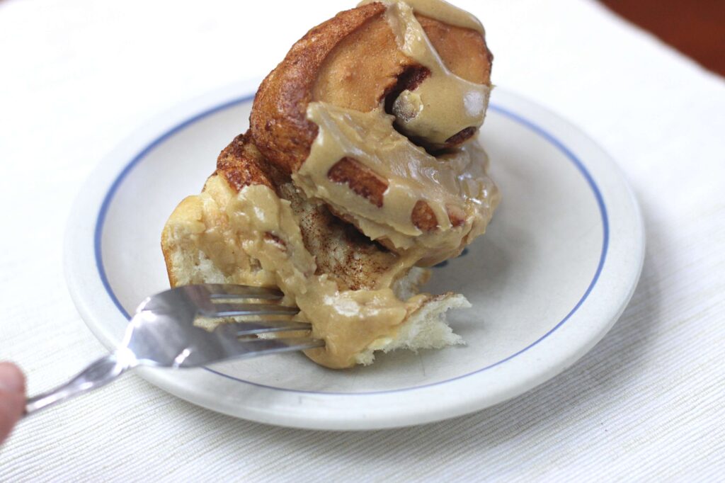 fluffy sourdough cinnamon rolls with coffee glaze 